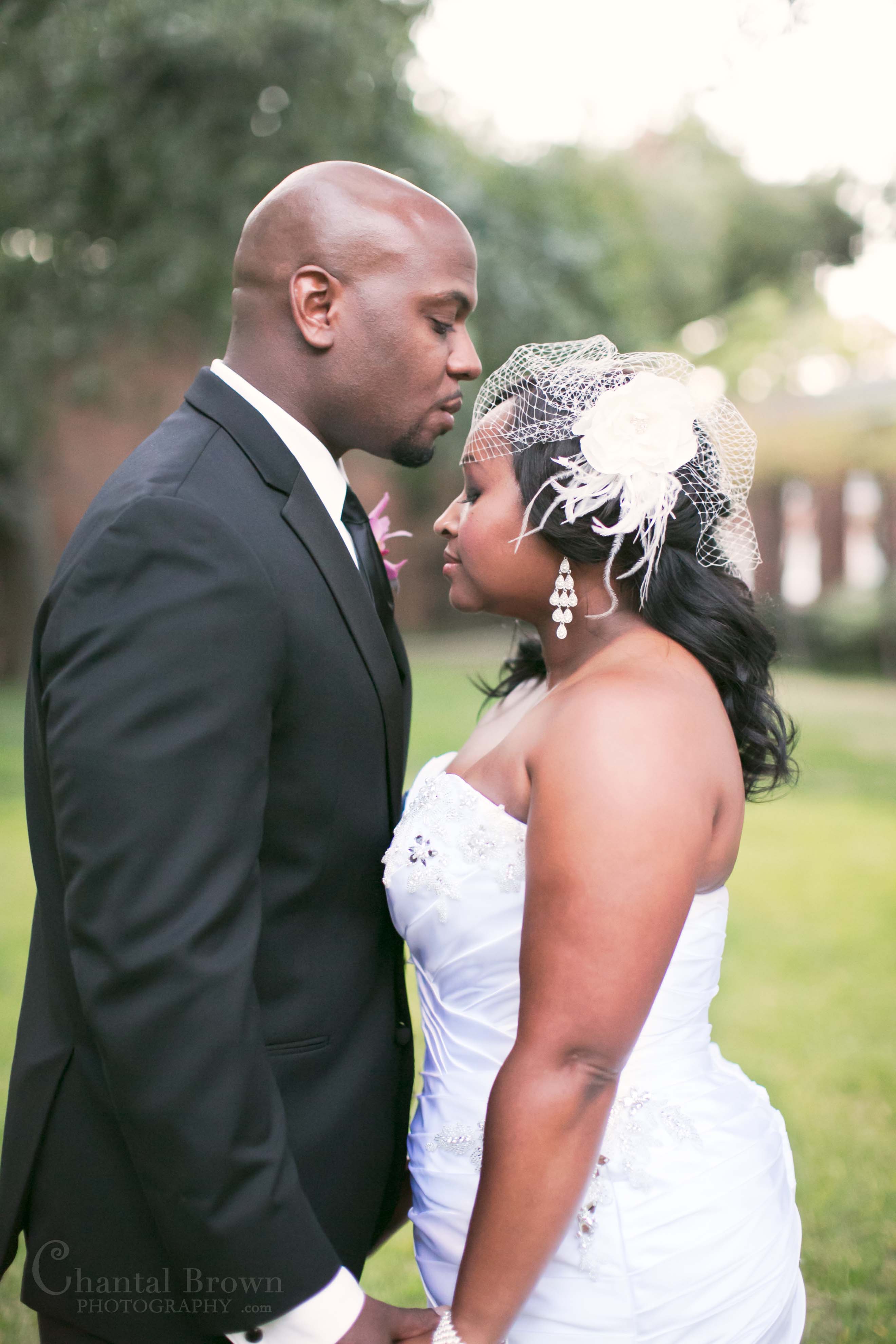 NYLO-Hotel-Dallas-Wedding-30 bride groom holding hands at Royal Lane Church Ceremony Dallas Wedding Photographer